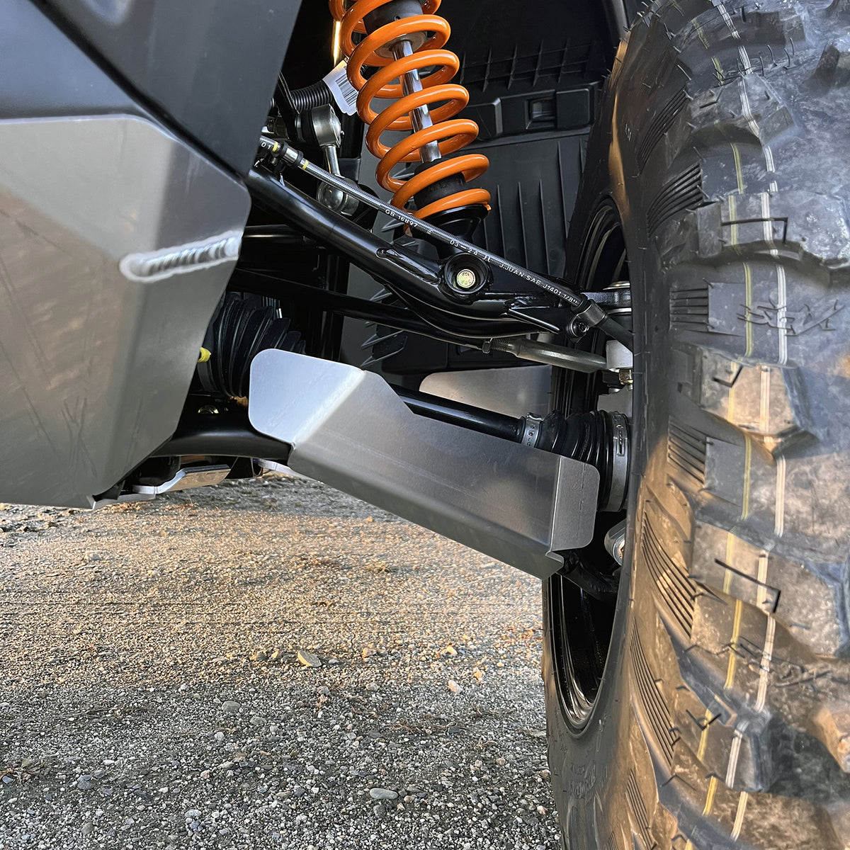 2025+ Can-Am Outlander 1000R XT with PERFEX™ 3/16" Aluminum Left Front A-Arm Guard. Heavy-duty ATV suspension protection for extreme off-road conditions.