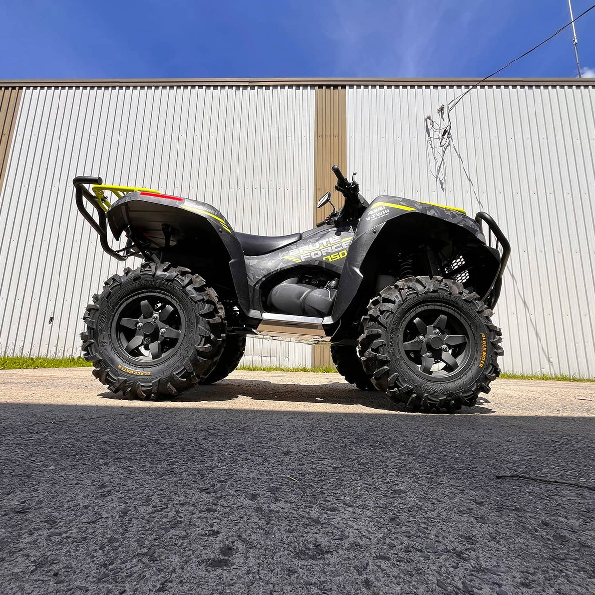 PERFEX Industries 3/16" aluminum skid plate and 2-inch lift kit on a 2023 Kawasaki Brute Force 750, offering unparalleled ATV protection and off-road capability.
