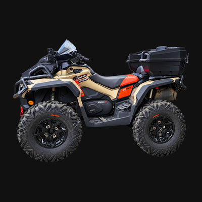 Side view of a Can-Am Outlander X MR 1000R equipped with a PERFEX 2-inch lift kit and larger off-road tires.