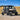 CFMOTO UForce 1000 XL with a PERFEX 2-inch lift kit, shown from a front three-quarter angle with 30" off-road tires.