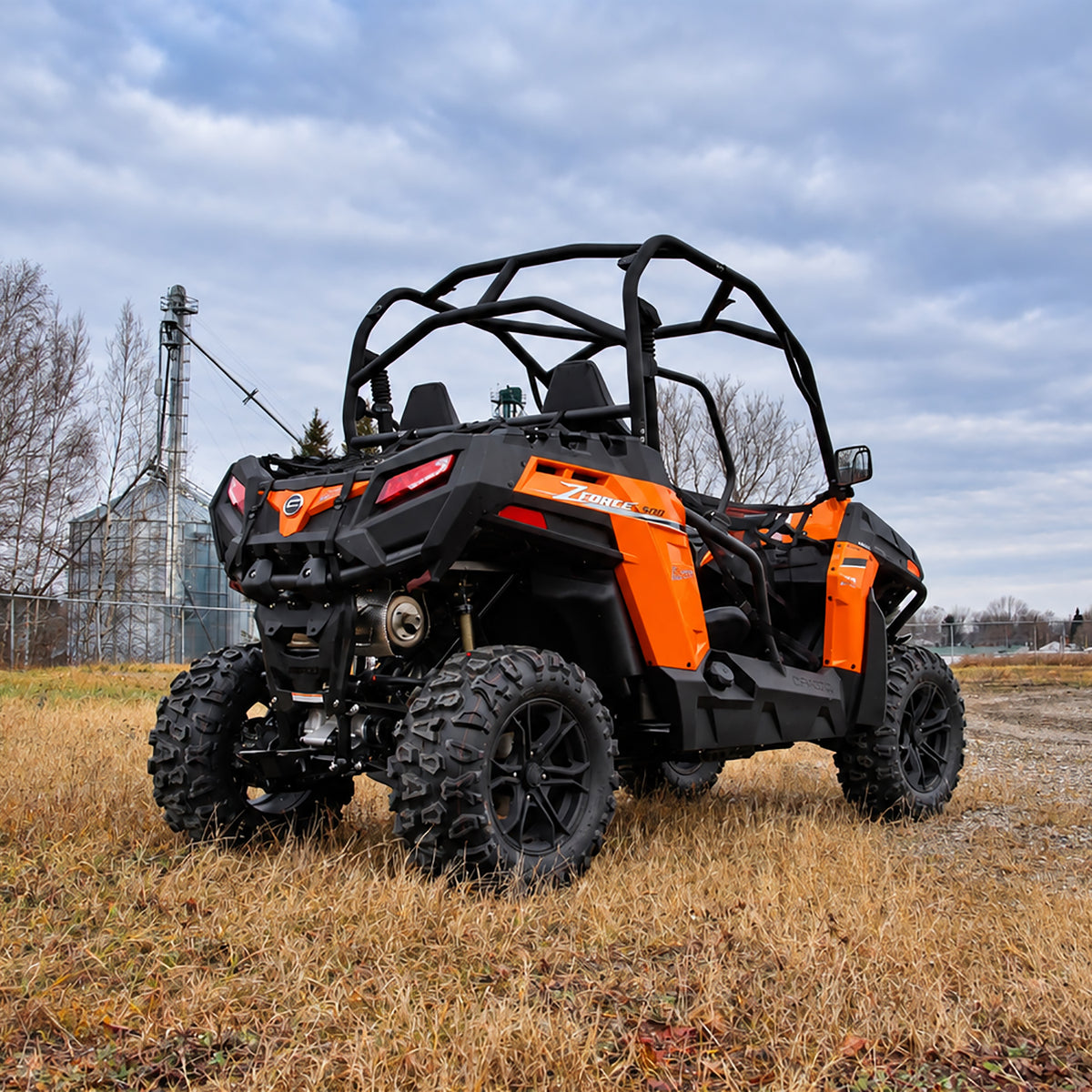 Rear three-quarter view of a CFMOTO ZForce 500 Trail with PERFEX 2" lift kit installed.