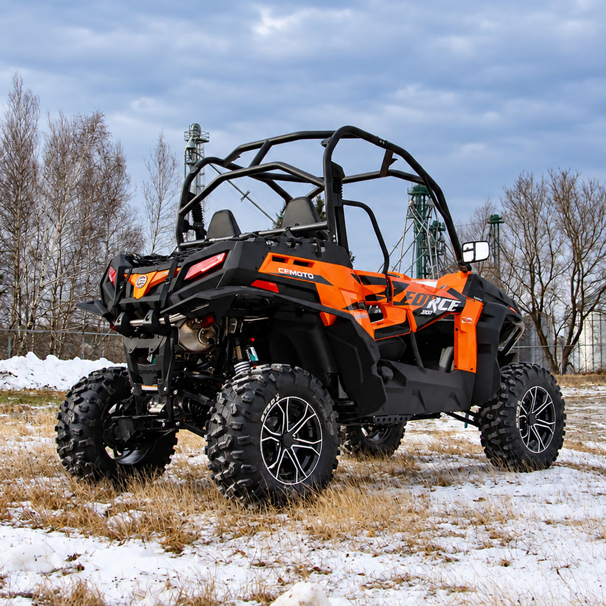Rear three-quarter view of a CFMOTO ZForce 1000 with PERFEX 2" suspension lift and off-road tires.