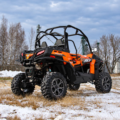 Rear three-quarter view of a CFMOTO ZForce 1000 with PERFEX 2" suspension lift and off-road tires.