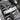 Close-up of PERFEX left aluminum foot peg on a Can-Am Outlander G3 1000R XT-P ATV, highlighting the 20° angled sides for superior traction.