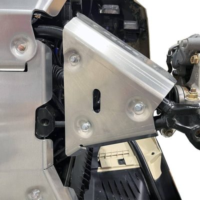 White background image of a Can-Am Outlander PRO, focusing on the PERFEX Industries front A-arm guards protecting the suspension components of the ATV. Ideal for off-road adventures.