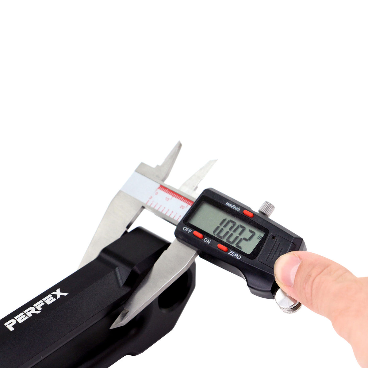Digital caliper confirming the 1-inch thickness of the PERFEX CNC-machined aluminum ATV hawse fairlead, built with 4-7/8" mounting hole spacing.