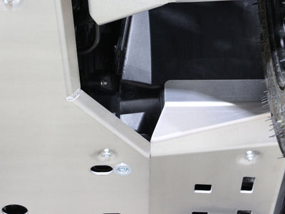 PERFEX aluminum footwell skid plate with raised front section protecting the rider from debris on a Can-Am Outlander MAX 6x6 450 G2L ATV