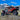 Honda Talon 1000 X-4 UTV on a rock amidst the mountains for the 'Customer Reviews' page of the Perfex website.
