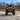Front view of a CFMOTO CForce 600 Touring ATV equipped with a PERFEX 1.5" lift kit.