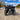 Rear view of a Can-Am Outlander X MR 850 showing the lifted suspension and wider off-road stance.